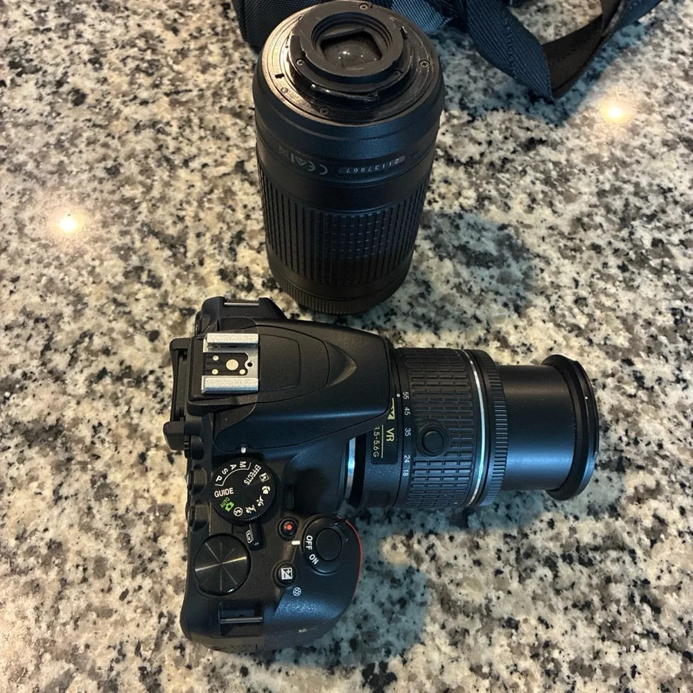 Nikon Black Digital Camera with Ergonomic Design and Professional Lens